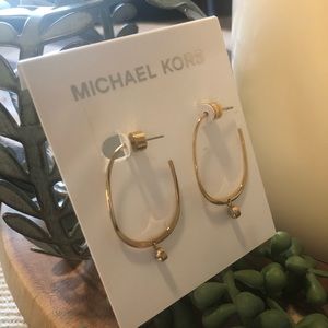 Michael Kors gold earrings with cubic zirconia